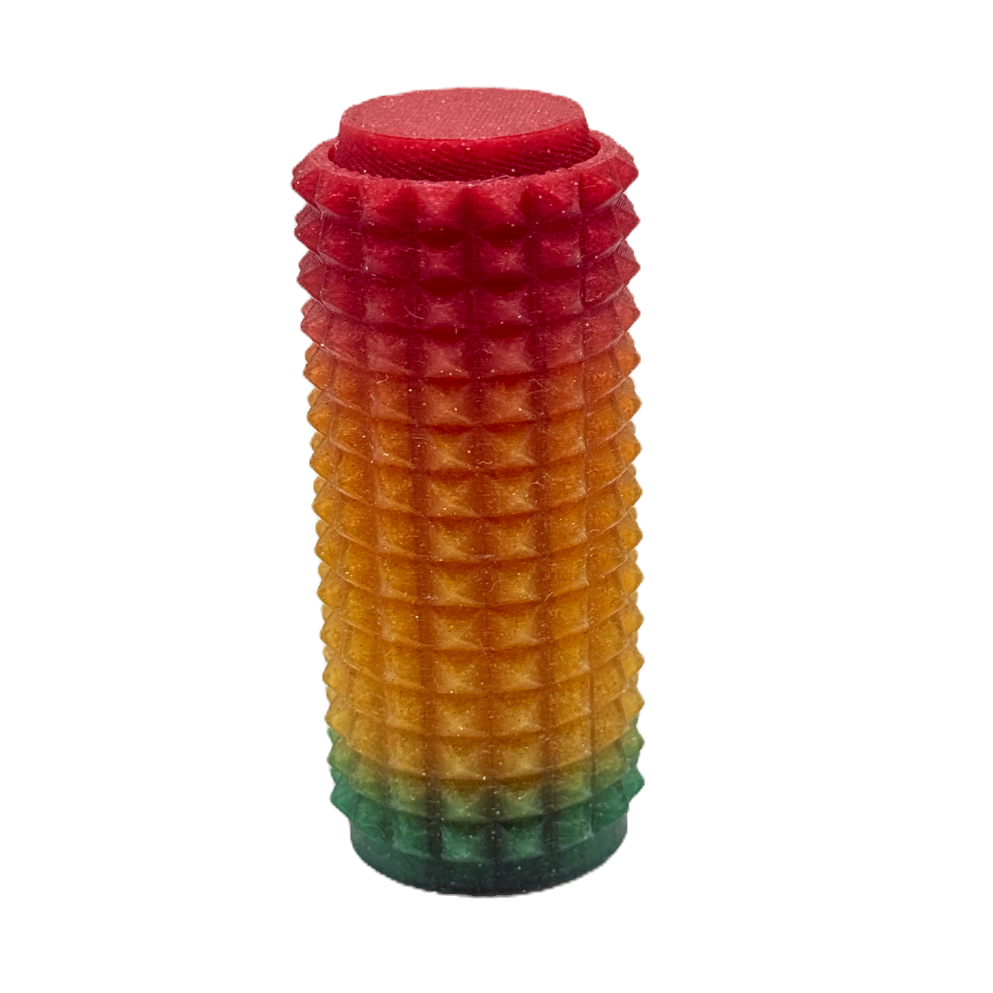 Colorful textured cylindrical object with a red top, orange middle, and green base on a white background.